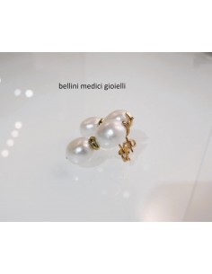 Orecchini con doppia perla...